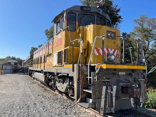 Train parked out front