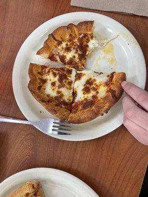 Cheese 1-Topping personal (kids hand for size reference)