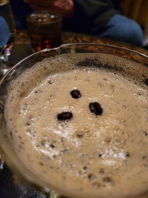 Cocktail served in a broken glass