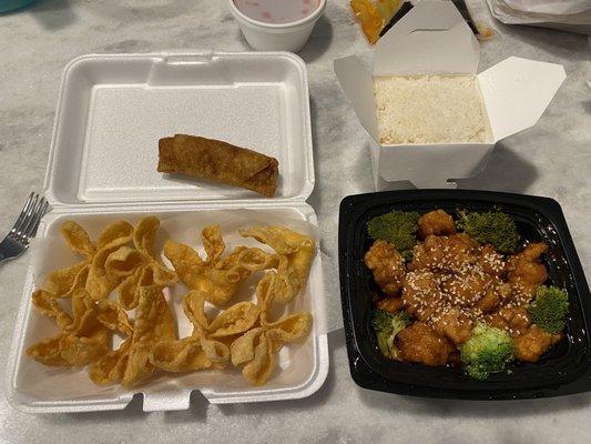 Sesame Chicken (with white rice), egg roll, crab ragoons.