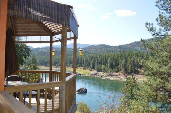 Dine outdoors on our deck overlooking the river.