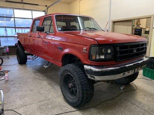 Restoring the paint on this monster Ford Cummins