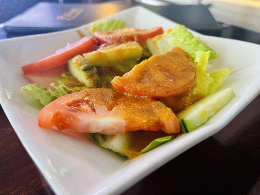 Rain salad - lettuce, sliced tomatoes and cucumber on a homemade ginger dressing ($4.95)