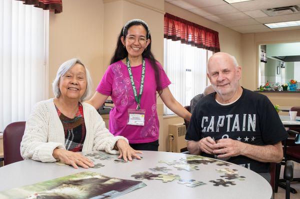 Oak Park Adult Day Care staff member with participants