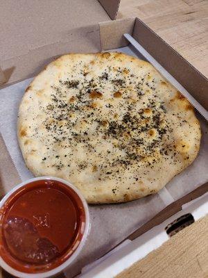 Basil Bread sticks and a side of Signature tomatoe Sauce