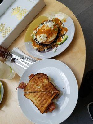 Eggs rancheros and NY style bacon eggs sandwich