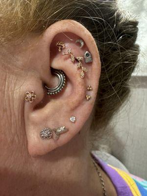 11/12/24 Lexi pierced the flat, faux rook and low helixes. All the jewelry was added with the exception of the daith & tragus (Thanks Tori!)