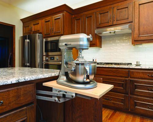 Refaced kitchen with a modified cabinet to hold a new mixer lift stand!