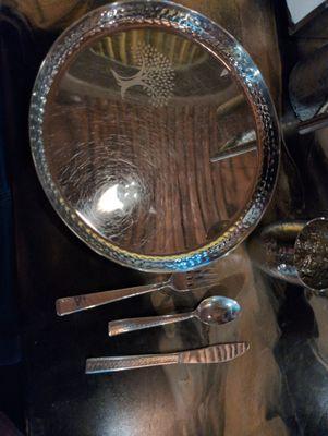 Love the hammered steel serving ware