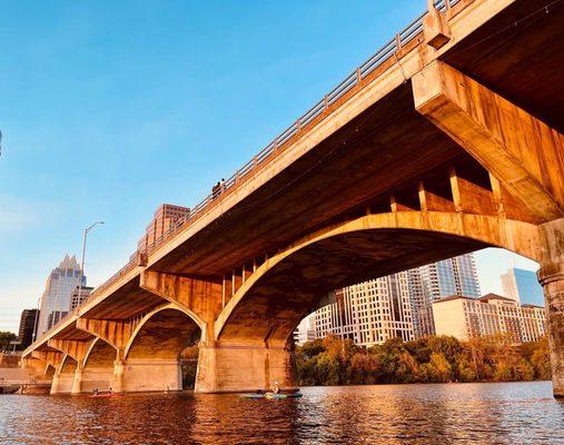 Ride a kayak up Lady Bird Lake and observe the famous Congress Bridge bats