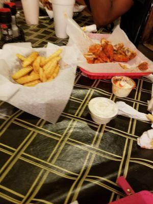 Hot wings and fries are Hot and fresh!