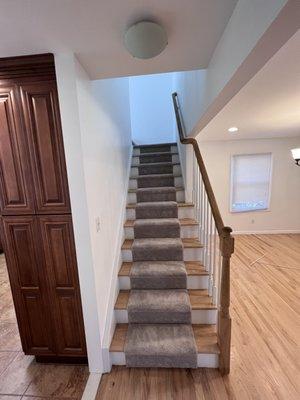 Painted risers white sanded and natural wood wood finished stair step
 After