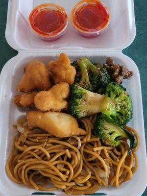 Chow mein with sweet and sour chicken and broccoli beef sides.