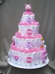 Diaper Cakes are great gifts for the new mom, they are loaded with all the tools she needs : diapers, rattles, bottles & more