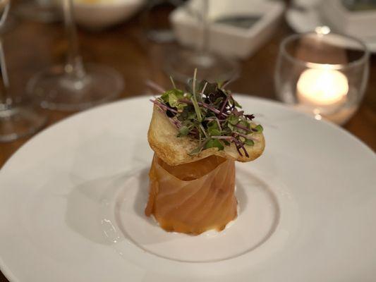 Signature dish smoked salmon with crispy hen egg, thin potato and greens