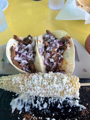 Spicy steak tacos and street corn. Yummy!