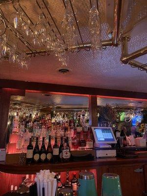 Bar area. Beautiful lighting. Great bartenders. All of the food is amazing.