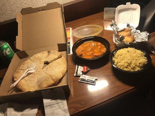 Everything I ordered. Not sure what the ketchup packets were for? Maybe the dried, crusty, overcooked naan?