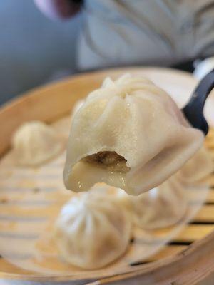 Shanghai Soup Dumplings deliciously (cautiously) hot from the steamer.