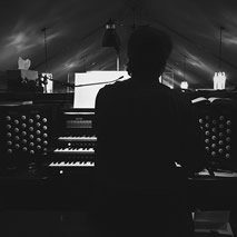 Mr. Edwards himself playing on pipe organ in one of the churches in Worcester, MA