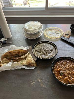 Lamb saag, garlic naan, cauliflower & potato masala