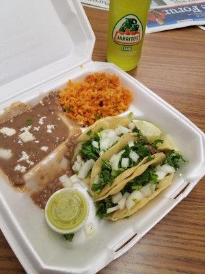 Asada street tacos with rice and beans. I added the Jarritos and it still came in under $10.