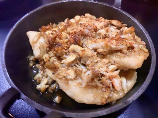 Fried Pirogies with brown butter and crab meat.