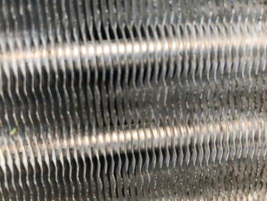 Close up of chemically cleaned condenser coil.