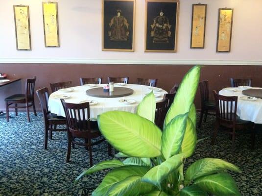 Dining room with 2 large round tables for 10 each