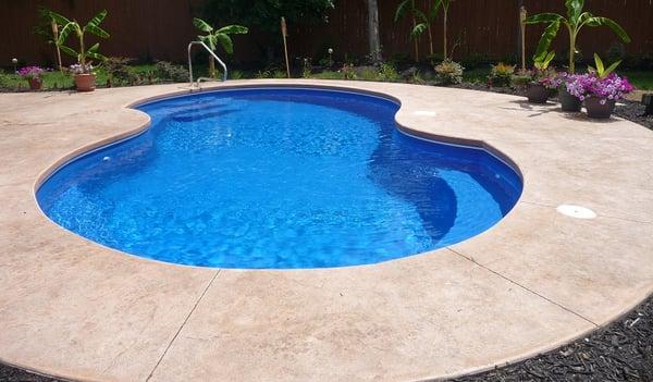 Blue fiberglass pool.