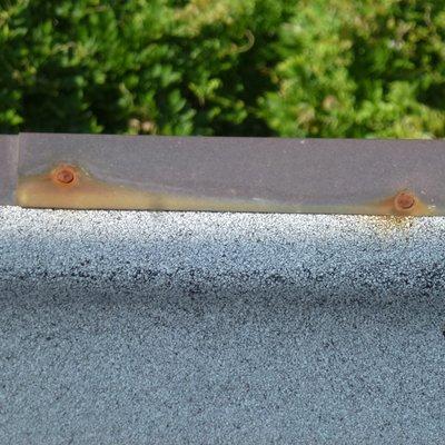 When one installs copper flashing, the nails are supposed to also be copper. Not done so here.