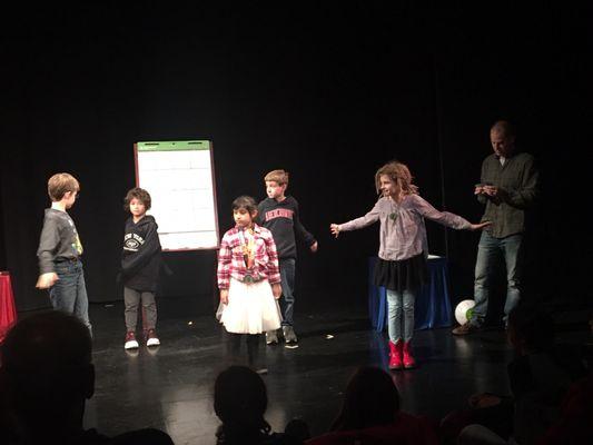 Stage mentalism support (my daughter in red Doc Martins) with the great Mr. Sam Eaton.