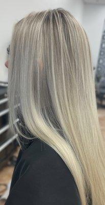 Blonde highlight done by stylist Nikky