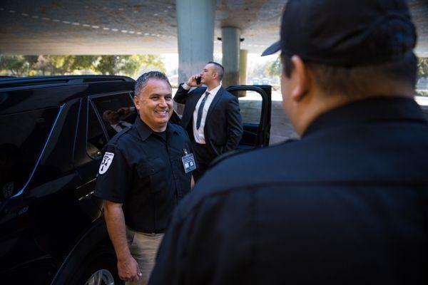 Guardians executive protection team (bodyguards) and armed guards working together.