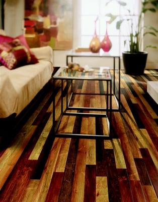 This room uses the same wood flooring in a mix of 3 different colors for a rustic look.