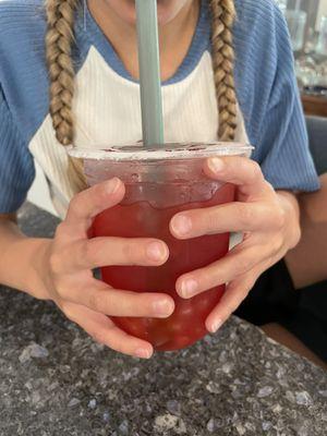 Watermelon green tea refresher with mango popping boba