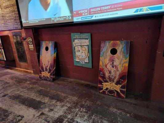 Indoor cornhole boards.