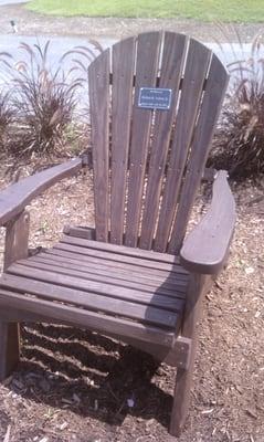 One of the memorial chairs overlooking the driving range. A great place to watch the action on the driving range