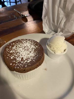 Chocolate soufflé, served with vanilla ice cream