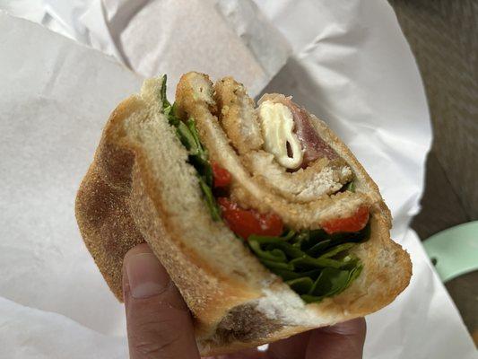 RICHIE JR chicken cutlet, fresh mozzarella, prosciutto, roasted peppers, arugula, balsamic on clubn roll ($14)