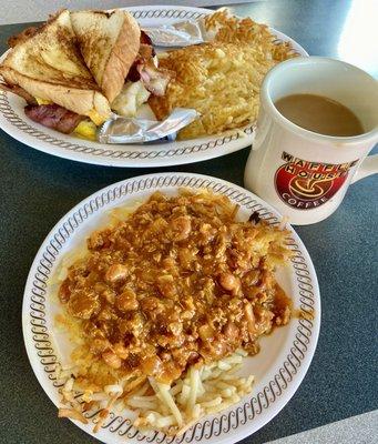 Hash browns with chili on top and the sandwich and a coffee