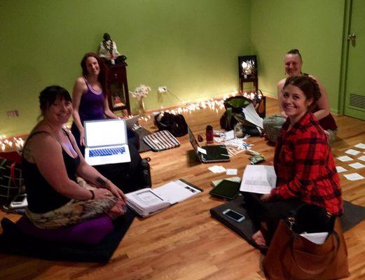 Teacher Trainers, Elena, Aasha, Kisa and Meg preparing for an upcoming Teacher Training