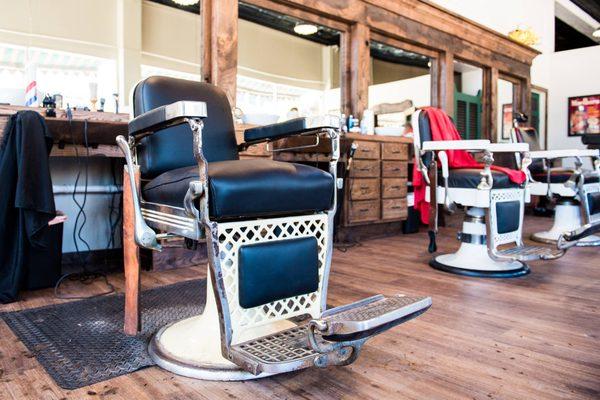 Vintage chairs and reclaimed wood. Cool!