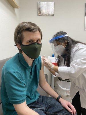 Vaccination room. My husband's turn.