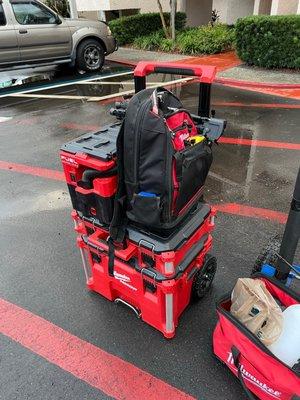 Milwaukee pack out, backpack and cordless vacuum