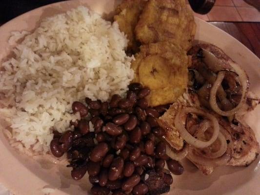 Rice, beans, tostones, and pollo a la plancha.