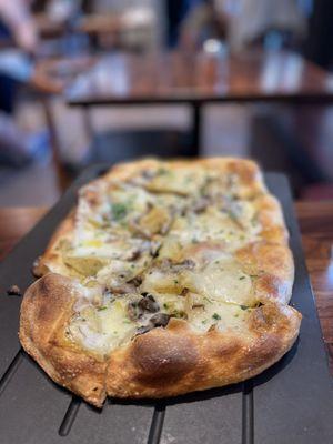 Truffle mushroom pizza with Yukon potato.