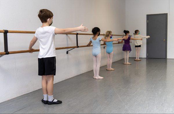 Ballet Students at the bar. 
 Photo by Peter Lichty