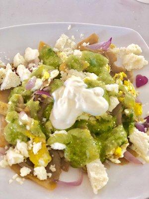 Green chilaquiles yum  Queso Fresco & sour cream from their deli. Tortillas from Angel brand they get from San Diego.