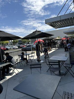 a lot of people waiting an hour plus for a free chicken sandwich, in 100 degree weather, moving so slow, many people are leaving the line